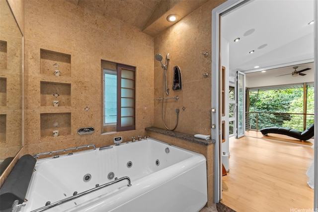 3233 Allan Pl, Honolulu, HI 96817 - bathroom with a tub with jets, a ceiling fan, recessed lighting, and wood finished floors