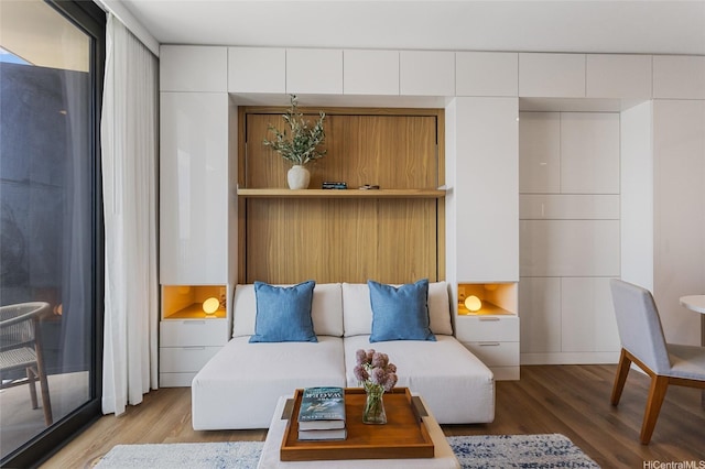 987 Queen St Unit 3209, Honolulu, HI 96814 - sitting room with wood finished floors