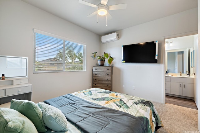 91-1725 Kapeku Loop, Ewa Beach, HI 96706 - bedroom with a wall unit AC, carpet flooring, connected bathroom, and a ceiling fan