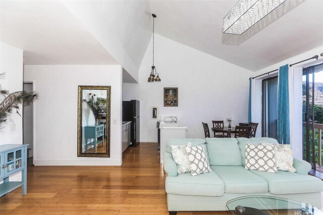 84-718 Ala Mahiku St Unit 21/97C, Waianae, HI 96792 - living area with light wood finished floors and high vaulted ceiling