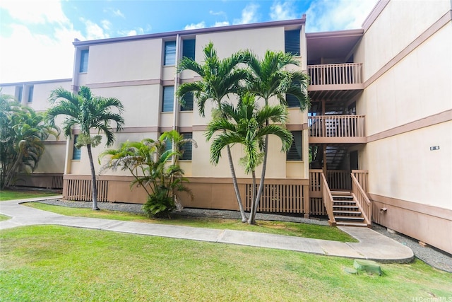 84-718 Ala Mahiku St Unit 21/97C, Waianae, HI 96792 - view of building exterior featuring stairway