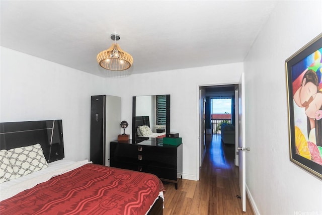 84-718 Ala Mahiku St Unit 21/97C, Waianae, HI 96792 - bedroom featuring wood finished floors and baseboards