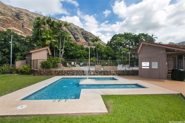 84-718 Ala Mahiku St Unit 21/97C, Waianae, HI 96792 - community pool with a mountain view, a patio, and a hot tub