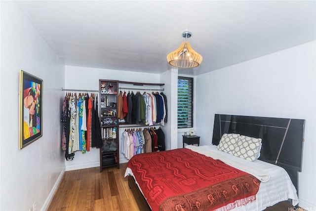 84-718 Ala Mahiku St Unit 21/97C, Waianae, HI 96792 - bedroom with wood finished floors and a closet