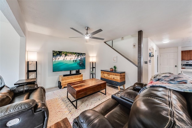 91-630 Kilaha St Unit 1, Ewa Beach, HI 96706 - living room with a ceiling fan and stairway