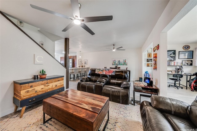 91-630 Kilaha St Unit 1, Ewa Beach, HI 96706 - living area with a ceiling fan, light wood-type flooring, and stairway