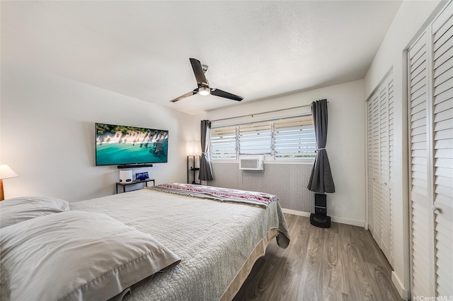 91-630 Kilaha St Unit 1, Ewa Beach, HI 96706 - bedroom featuring wood finished floors, a closet, and a ceiling fan