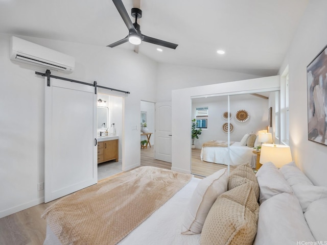 95-161 Kauopae Pl, Mililani, HI 96789 - bedroom with a wall mounted AC, a barn door, vaulted ceiling, light wood-style flooring, and recessed lighting