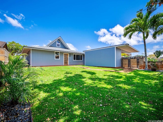 95-161 Kauopae Pl, Mililani, HI 96789 - rear view of house featuring a gate