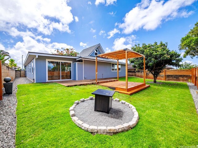 95-161 Kauopae Pl, Mililani, HI 96789 - back of property featuring a wooden deck, a fenced backyard, and a pergola