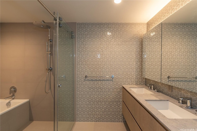 1000 Auahi St Unit 2007, Honolulu, HI 96814 - full bath with tile walls, a tile shower, double vanity, a garden tub, and decorative backsplash