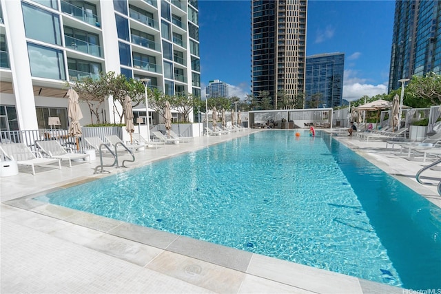 1000 Auahi St Unit 2007, Honolulu, HI 96814 - community pool with a patio and a city view