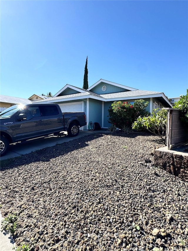 68-3521 E Makuahine St, Waikoloa, HI 96738 - view of side of property featuring a garage