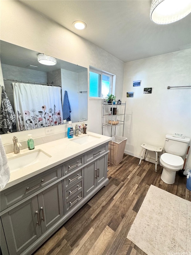 68-3521 E Makuahine St, Waikoloa, HI 96738 - full bath with double vanity, wood finished floors, and a shower with shower curtain