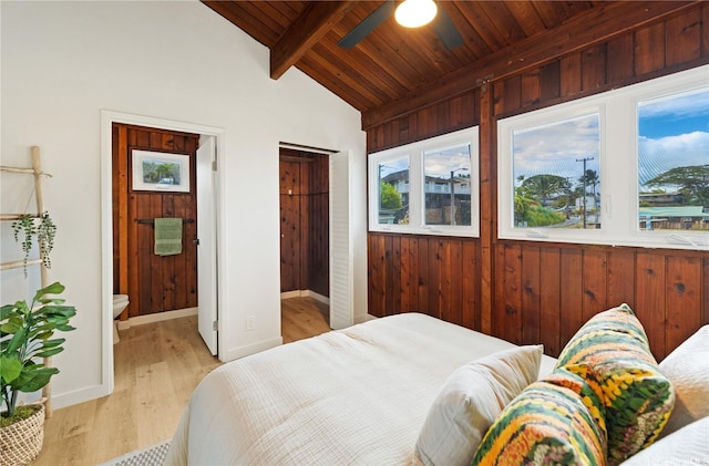 47-070 Laenani Dr Unit C, Kaneohe, HI 96744 - bedroom with wood ceiling, light wood-type flooring, wood walls, and ensuite bath