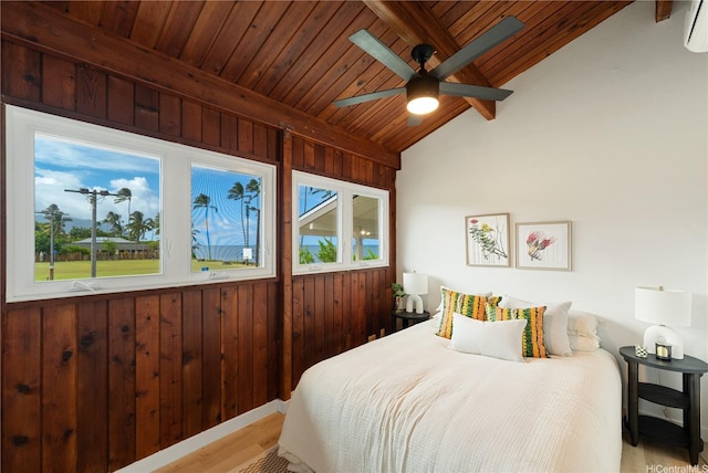 47-070 Laenani Dr Unit C, Kaneohe, HI 96744 - bedroom with wooden ceiling, multiple windows, wood walls, wood finished floors, and ceiling fan