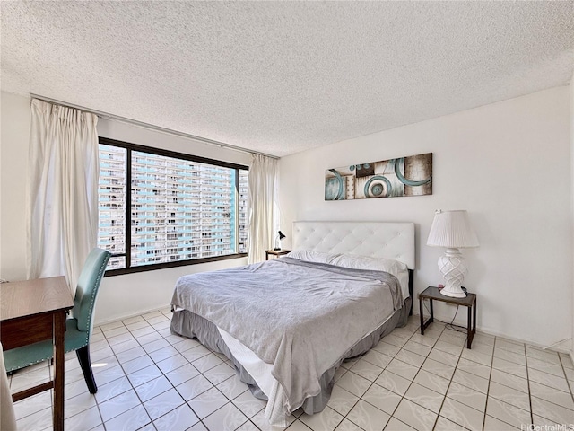 1778 Ala Moana Blvd Unit 2014, Honolulu, HI 96815 - bedroom with a textured ceiling and light tile patterned floors