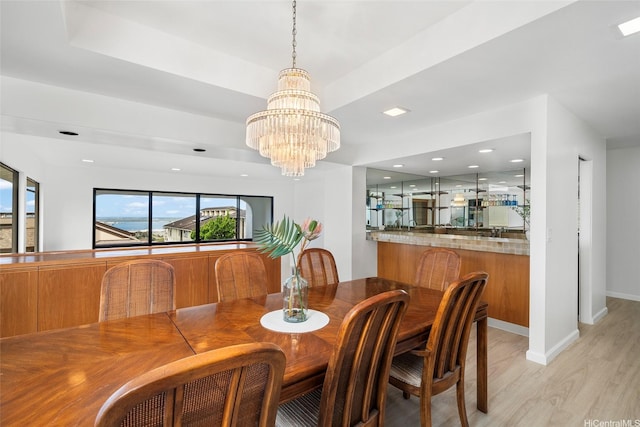98-653 Papalealii St, Aiea, HI 96701 - dining area featuring light wood-style flooring, a chandelier, and recessed lighting