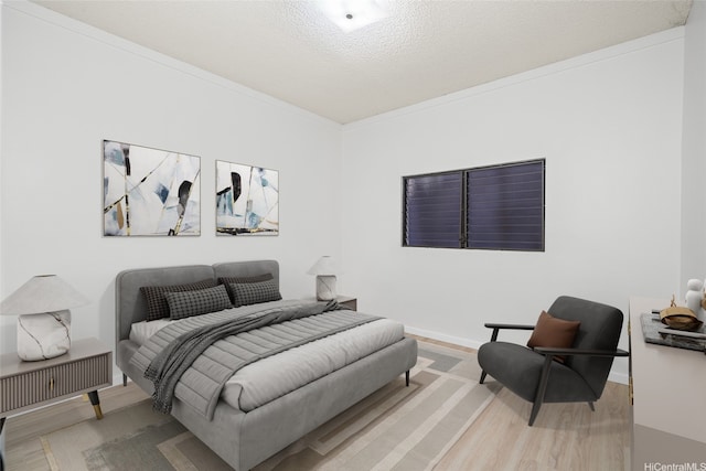 98-653 Papalealii St, Aiea, HI 96701 - bedroom featuring wood finished floors, a textured ceiling, and ornamental molding