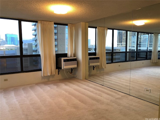 876 Curtis St Unit 1406, Honolulu, HI 96813 - unfurnished bedroom featuring carpet floors, a textured ceiling, and a city view