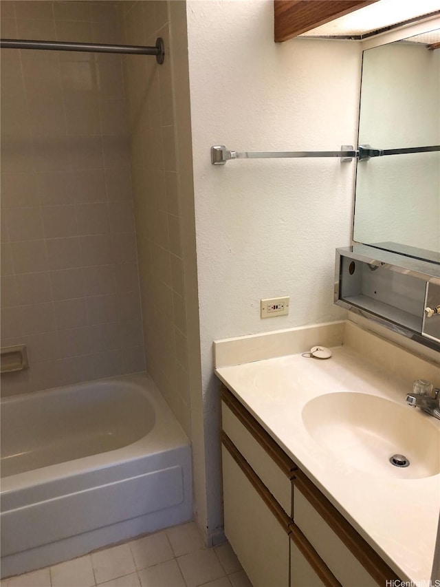 876 Curtis St Unit 1406, Honolulu, HI 96813 - bathroom with tile patterned floors, vanity, tub / shower combination, and a textured wall