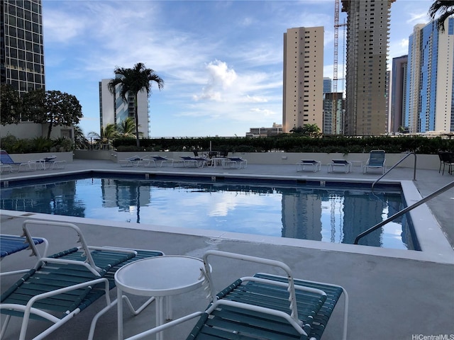 876 Curtis St Unit 1406, Honolulu, HI 96813 - community pool featuring a view of city and a patio