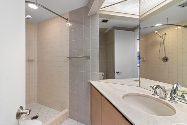 1212 Nuuanu Ave Unit 1104, Honolulu, HI 96817 - bathroom featuring tiled shower and vanity