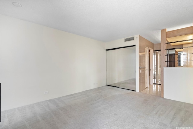 1212 Nuuanu Ave Unit 1104, Honolulu, HI 96817 - unfurnished bedroom with carpet floors and a closet