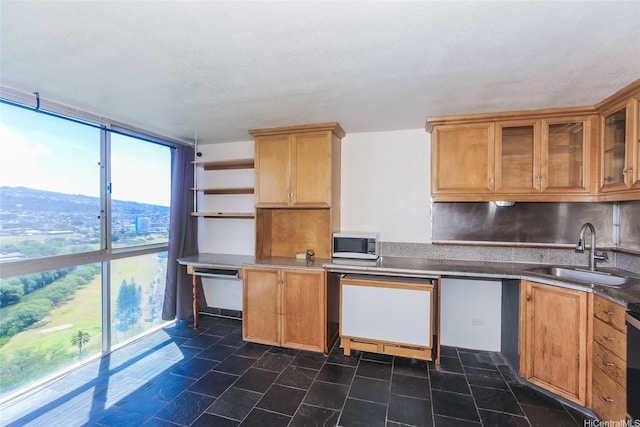 2211 Ala Wai Blvd Unit 2505, Honolulu, HI 96815 - kitchen featuring stainless steel microwave, glass insert cabinets, dishwashing machine, floor to ceiling windows, and open shelves
