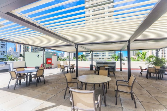 2211 Ala Wai Blvd Unit 2505, Honolulu, HI 96815 - view of patio featuring outdoor dining area and a view of city