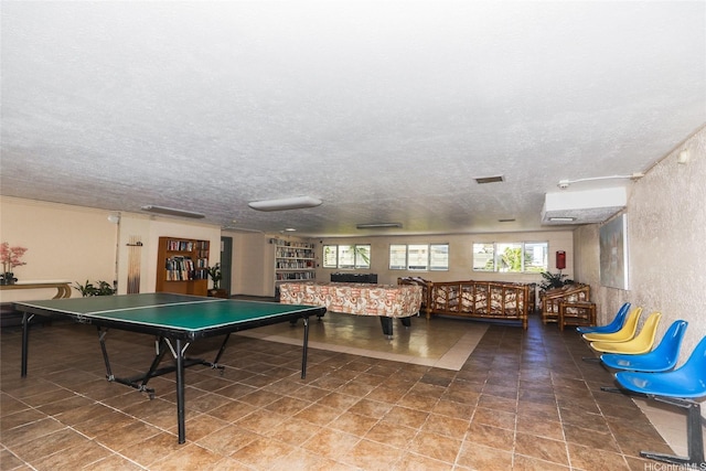 2211 Ala Wai Blvd Unit 2505, Honolulu, HI 96815 - recreation room featuring a textured ceiling