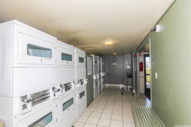 2211 Ala Wai Blvd Unit 2505, Honolulu, HI 96815 - kitchen featuring stacked washer / drying machine, light tile patterned flooring, and washing machine and dryer