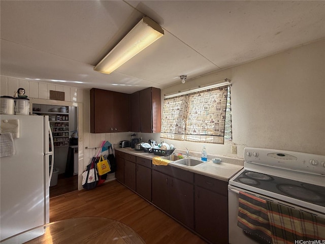 91-1337 Karayan St, Ewa Beach, HI 96706 - kitchen with white appliances, dark wood-style floors, dark brown cabinets, and light countertops
