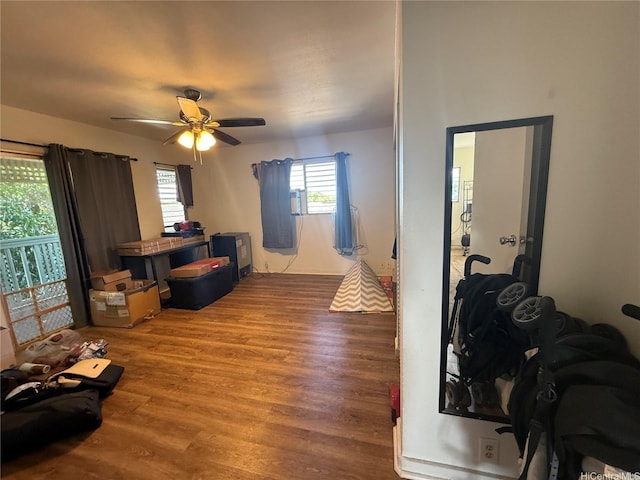 91-1337 Karayan St, Ewa Beach, HI 96706 - living area with wood finished floors and a ceiling fan