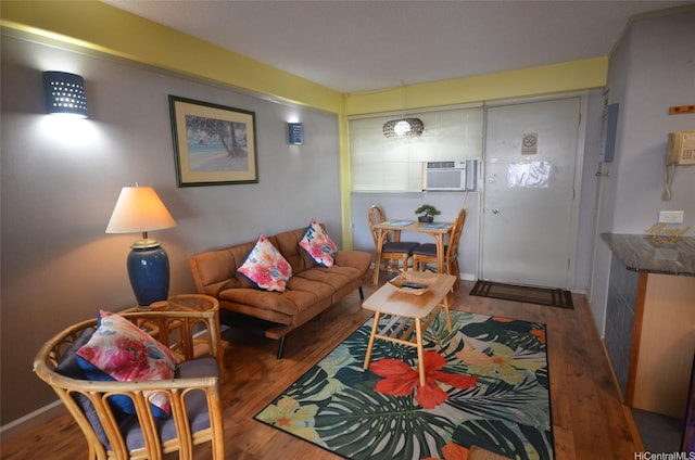 417 Nohonani St Unit 405, Honolulu, HI 96815 - living room featuring wood finished floors and a wall mounted air conditioner