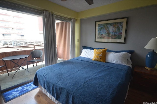 417 Nohonani St Unit 405, Honolulu, HI 96815 - bedroom with wood finished floors and ceiling fan