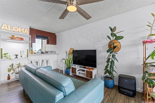 2121 Ala Wai Blvd Unit 2301, Honolulu, HI 96815 - living room with a textured ceiling, ceiling fan, and wood finished floors
