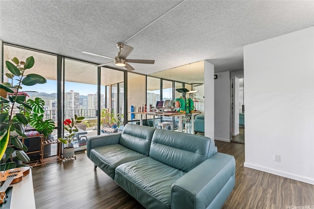 2121 Ala Wai Blvd Unit 2301, Honolulu, HI 96815 - living area with ceiling fan, a city view, floor to ceiling windows, wood finished floors, and a textured ceiling