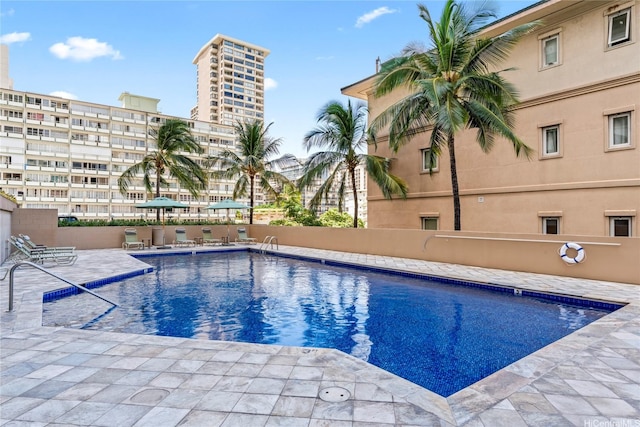 2121 Ala Wai Blvd Unit 2301, Honolulu, HI 96815 - community pool with a patio area