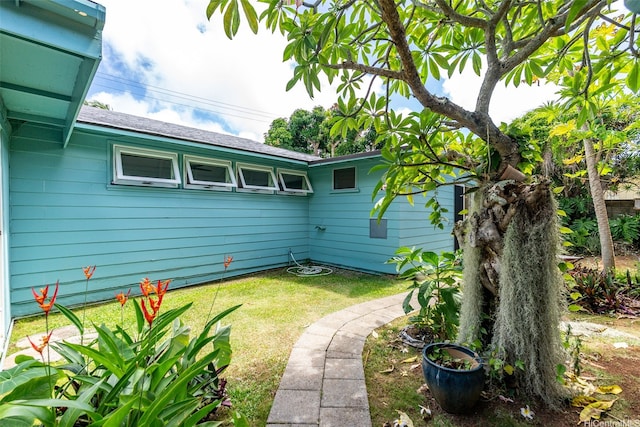 44-151 Bayview Haven Pl, Kaneohe, HI 96744 - view of home's exterior with a lawn