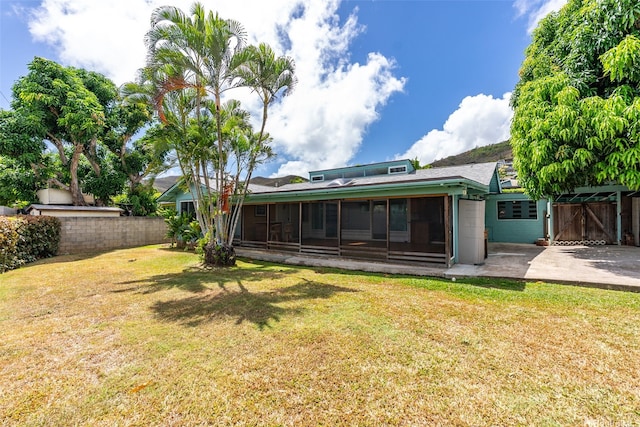 44-151 Bayview Haven Pl, Kaneohe, HI 96744 - back of house featuring a sunroom and concrete driveway