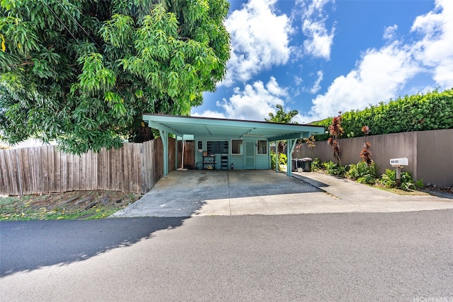 44-151 Bayview Haven Pl, Kaneohe, HI 96744 - manufactured / mobile home with concrete driveway and a carport
