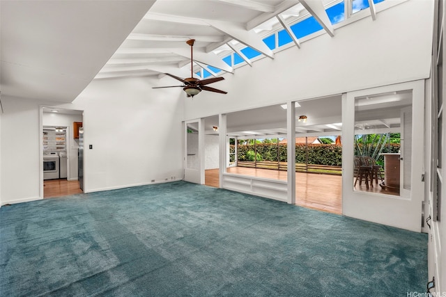 44-151 Bayview Haven Pl, Kaneohe, HI 96744 - unfurnished living room featuring carpet flooring, a ceiling fan, high vaulted ceiling, beamed ceiling, and a skylight
