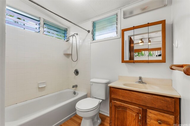 44-151 Bayview Haven Pl, Kaneohe, HI 96744 - full bathroom with vanity,  shower combination, and wood finished floors