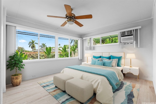 44-151 Bayview Haven Pl, Kaneohe, HI 96744 - bedroom with wood finished floors, a wall unit AC, crown molding, and a ceiling fan