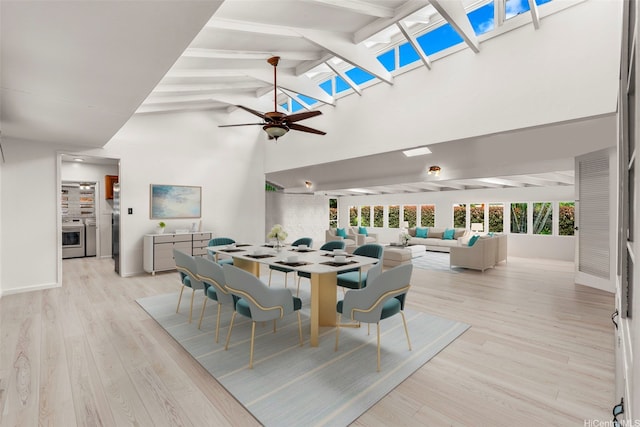44-151 Bayview Haven Pl, Kaneohe, HI 96744 - dining area with beam ceiling, ceiling fan, high vaulted ceiling, light wood finished floors, and a skylight