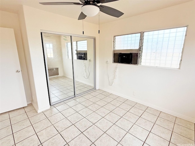 91-1206 Hanaloa St, Ewa Beach, HI 96706 - empty room featuring a ceiling fan and light tile patterned flooring