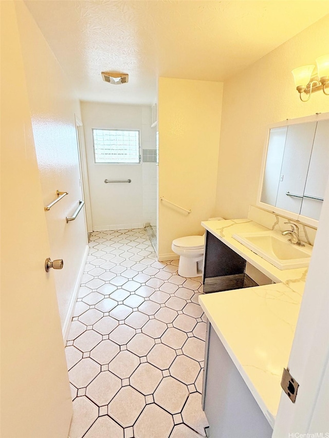91-1206 Hanaloa St, Ewa Beach, HI 96706 - full bath featuring vanity, a shower, and a textured ceiling