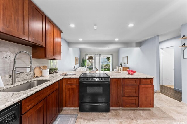 44-130-5 Mui Pl Unit 2605, Kaneohe, HI 96744 - kitchen with black appliances, a peninsula, decorative backsplash, light stone countertops, and recessed lighting