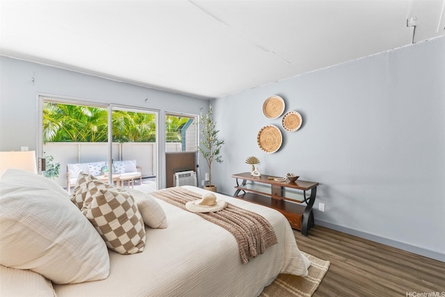 44-130-5 Mui Pl Unit 2605, Kaneohe, HI 96744 - bedroom featuring wood finished floors, access to exterior, and a wall unit AC